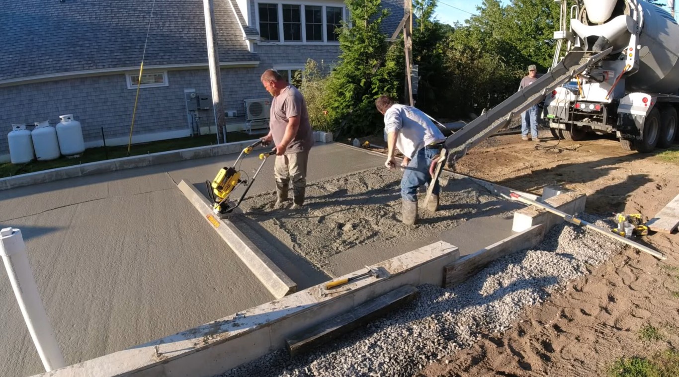 Professional concrete contractor team pouring concrete in Franklin, TN