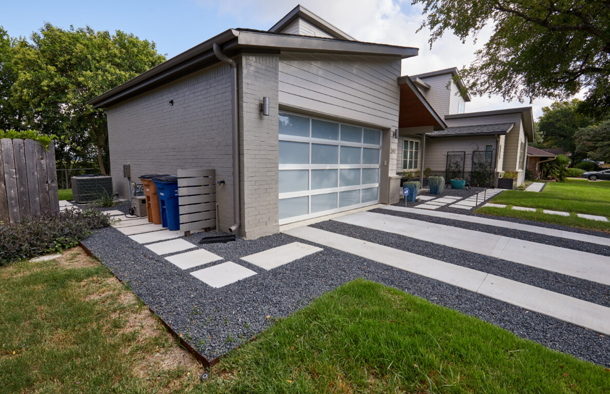 Modern concrete driveway installation in Franklin, TN with geometric pattern design